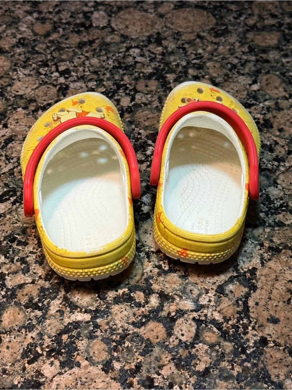 CROCS Kids' Yellow Winnie the Pooh Clogs with Red Strap